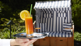 Cocktail im Garten des Hotel Wettstein