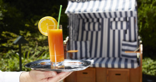 Cocktail im Garten des Hotel Wettstein