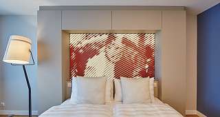 frontal ansicht bett superior zimmer hotel wettstein